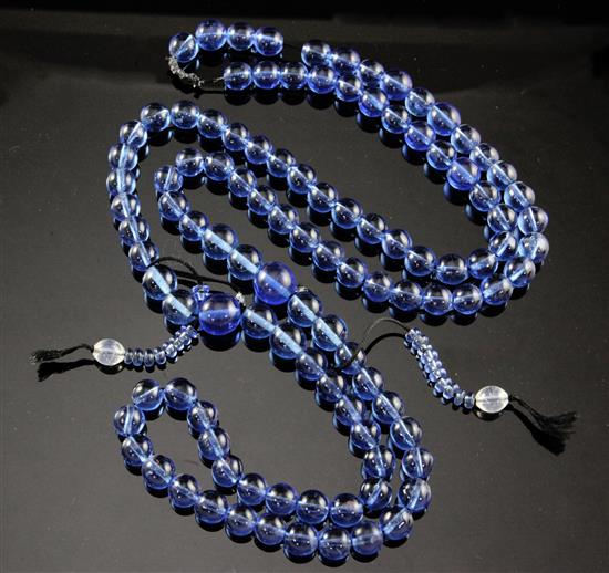 A Chinese blue glass bead Buddhist rosary, 65cm drop